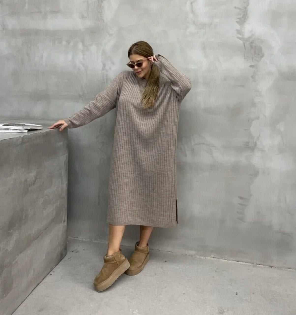 Pull tricote fendu a l`ourlet